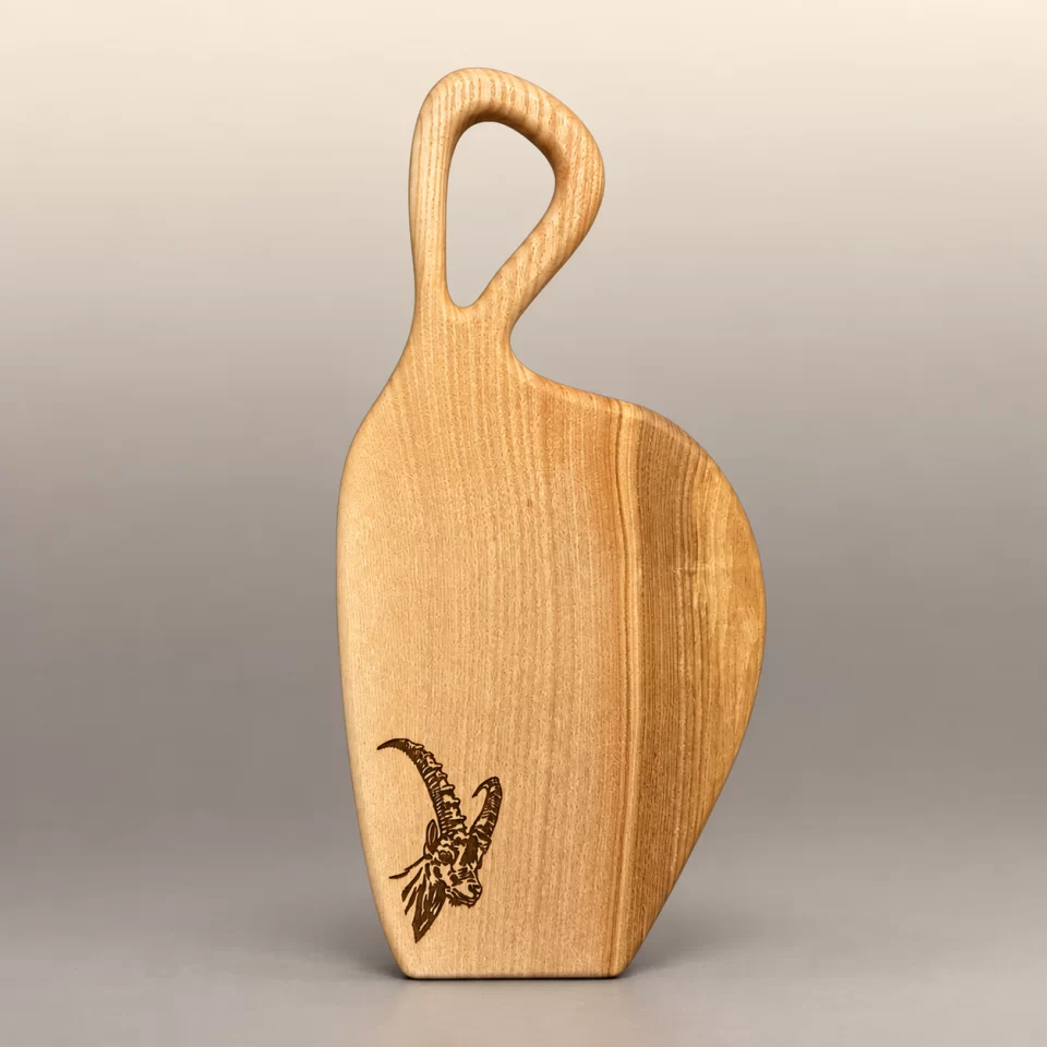 Natürliche Form mit Steinbockmotiv